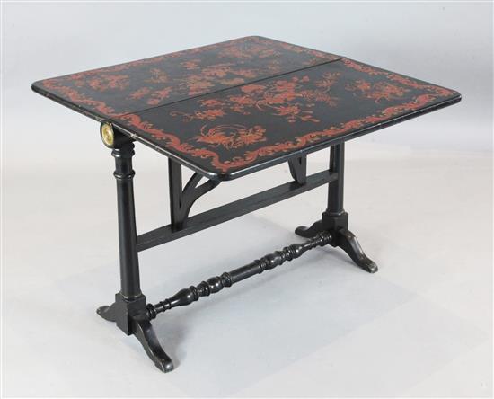 An unusual Victorian ebonised Sutherland table, W.2ft 10in. H.2ft 2in.